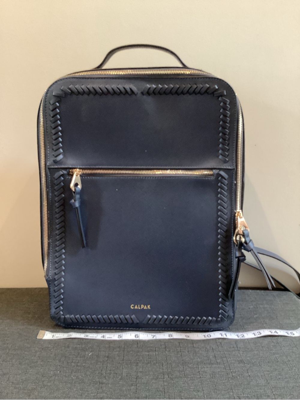 Calpak Navy Leather Backpack with Whipstitch Trim